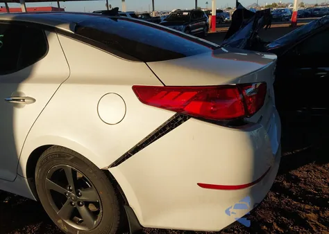 2015 Kia Optima Lx z USA, uszkodzony, nr VIN KNAGM4A70F5662787